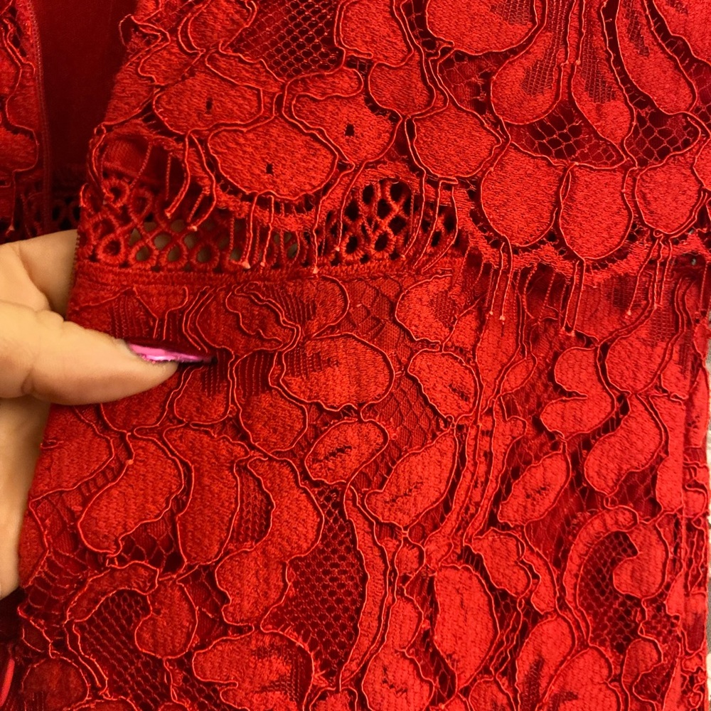 Just Me size medium (6/7) red Lacey brocade never worn out.  Tried on twice.